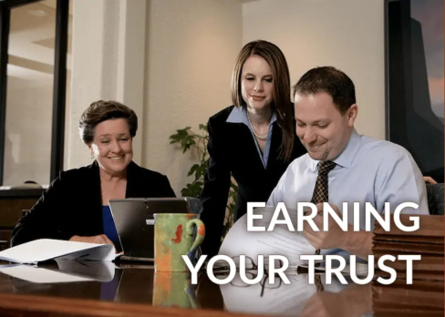 attorney with clients earning your trust