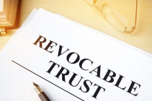 Revocable trust written on document for emphasis by a Sun City wills and trusts lawyer.
