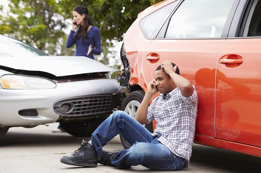 Driver calling police to report accident.