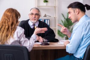 Couple in the lawyers office filing for divorce,