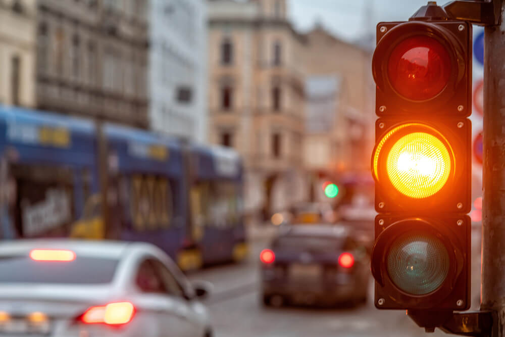 Traffic light signaling yellow.