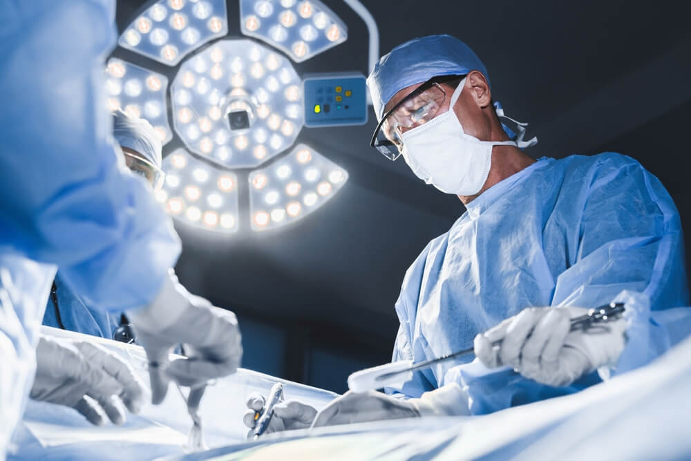 Focused surgeon in the operating room.