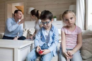 Children feeling sad over their parents fight.
