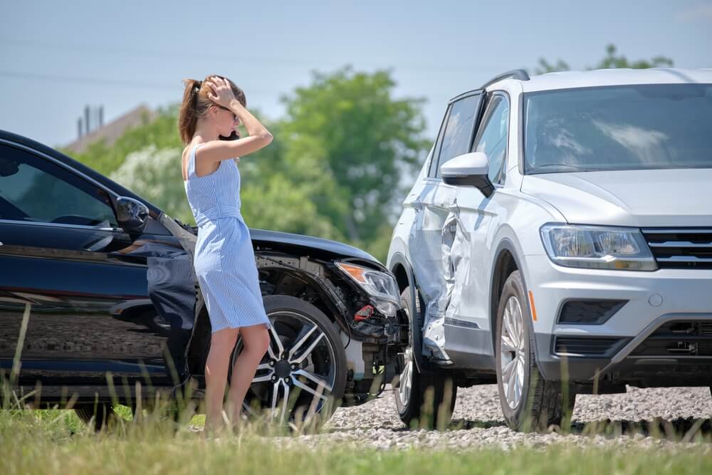 Worried lady driver in a tbone accident.